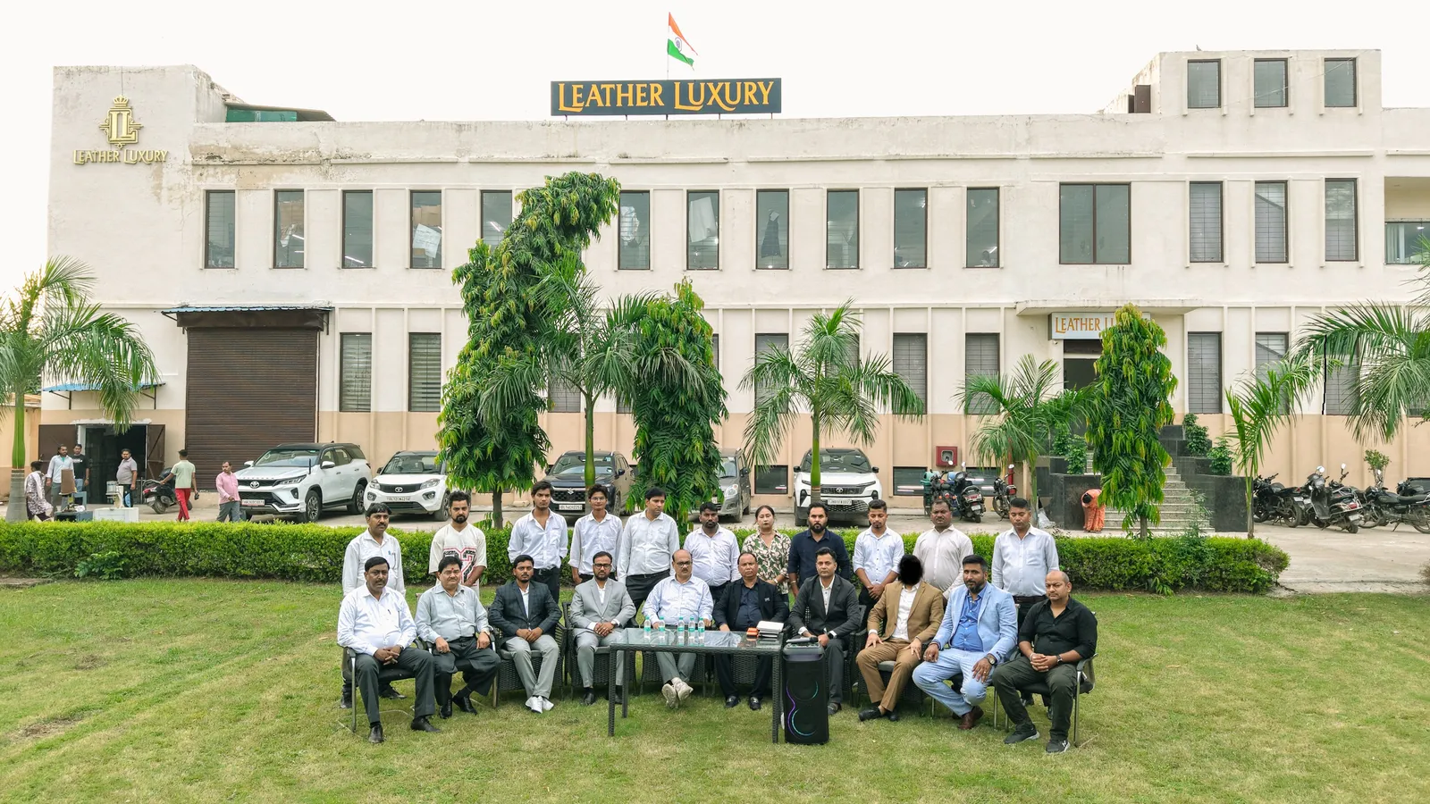 LEATHER LUXURY leadership and management in front of the factory building